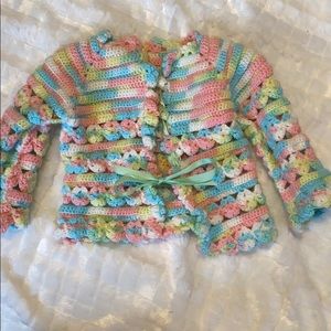 Handmade crocheted knitted infant girl cardigan